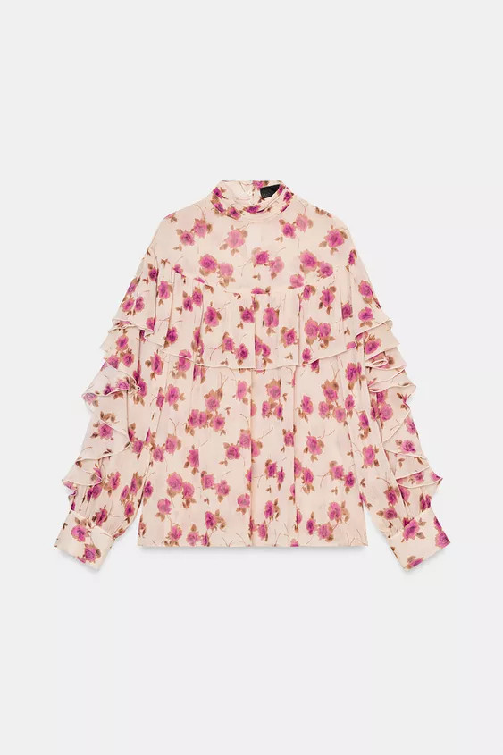 Floral print blouse with high neck and long sleeves. Ruffled trim. Back closure with opening and ... | Zara US