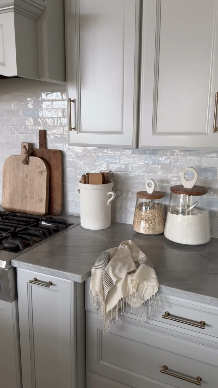 Functional and pretty kitchen styling! I always love displaying some of my most grabbed for item on our counters. My tip for styling kitchens is to utilize beautiful canisters or containers to hold your most grabbed for items! 

#LTKstyletip #LTKhome