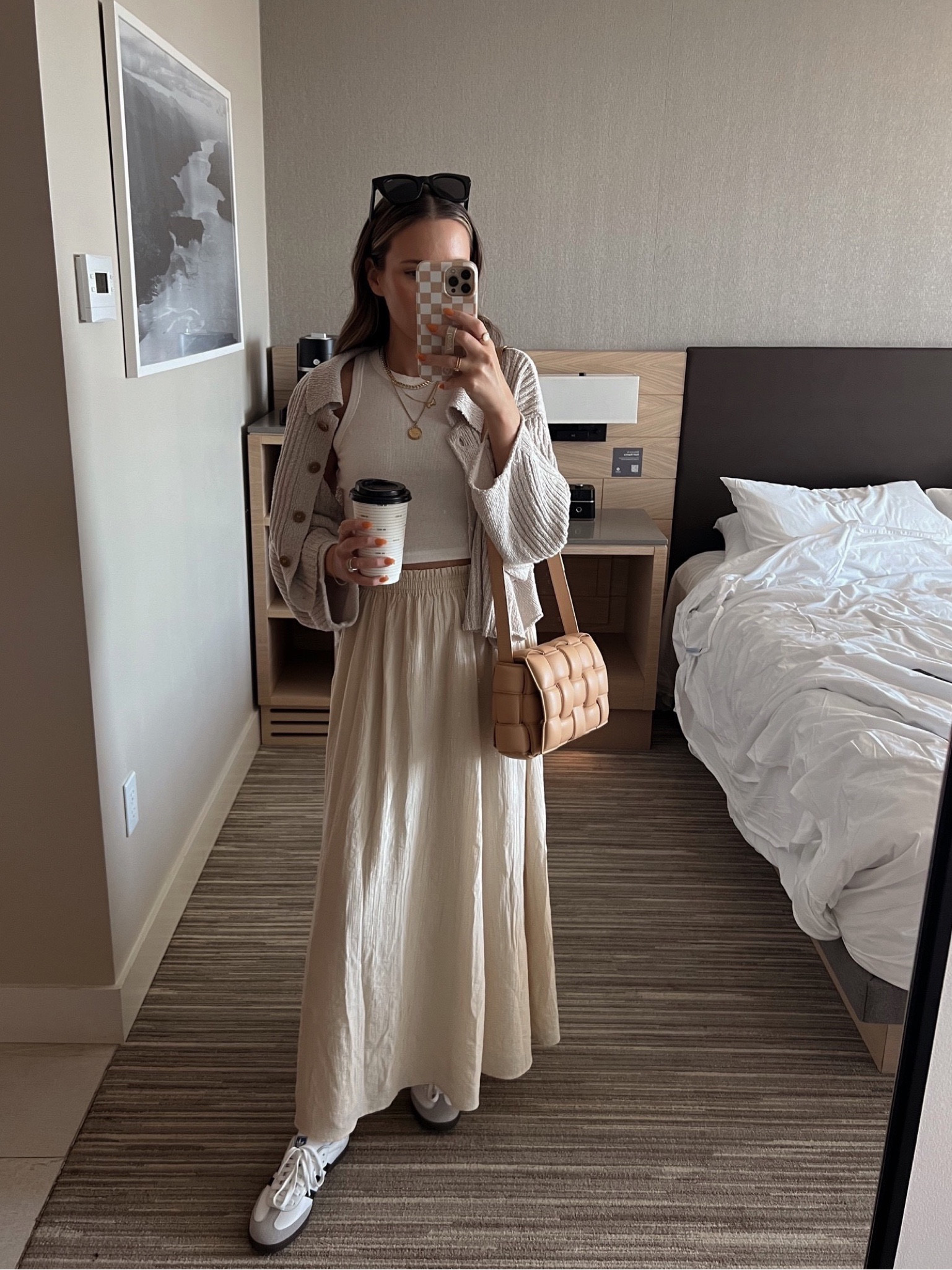 Easy early fall outfit🍂 my skirt is currently on sale! Wearing a xs skirt, xs cardigan and xs tank

Maxi skirt outfit / fall style / sambas outfit 

#LTKsalealert #LTKstyletip