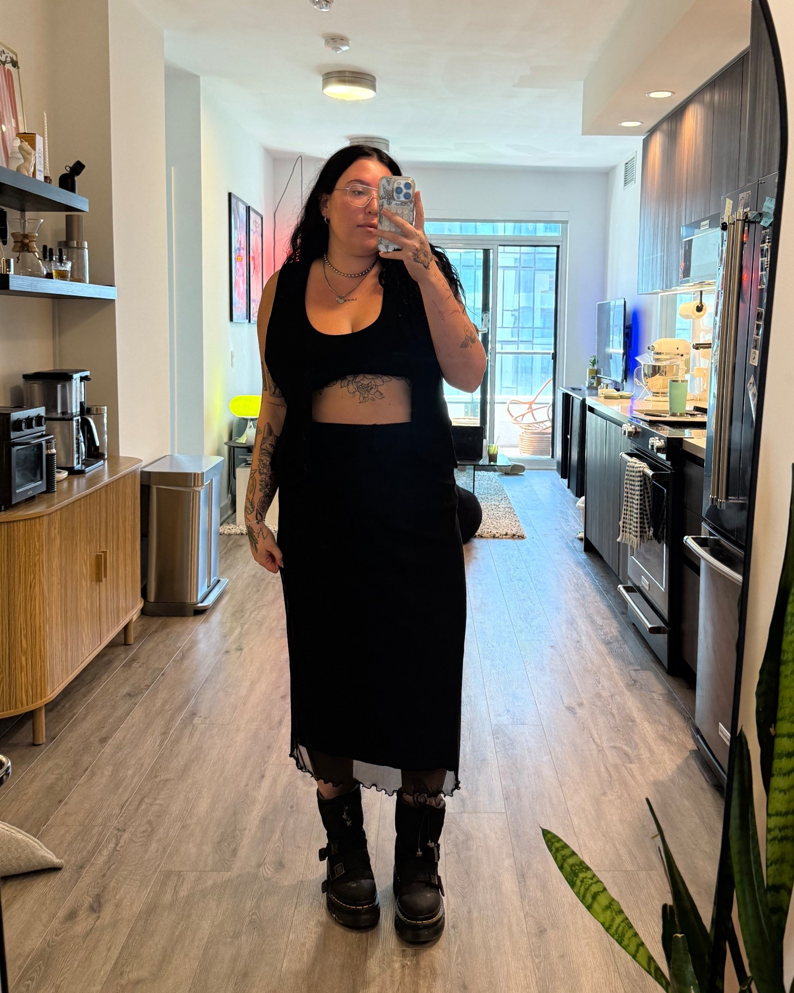 Casual date night fit 🖤
Wearing a black bralette (L) with a cropped vest (14) and midi skirt (XL)—paired with my fave puffy Dr. Martens for that chill but put-together vibe.
Perfect mix of tomboy femme and comfy confidence. Linked everything I can on LTK!

#DateNightOutfit #TomboyFemme #MidSizeStyle #QueerFashion #CasualButCute #DocMartensFit #LTKcurves #LTKfashion #LesbianStyle #TorontoStyle #MidSizeOOTD #AllBlackFit #ChunkyBootsStyle 

 #LTKU
