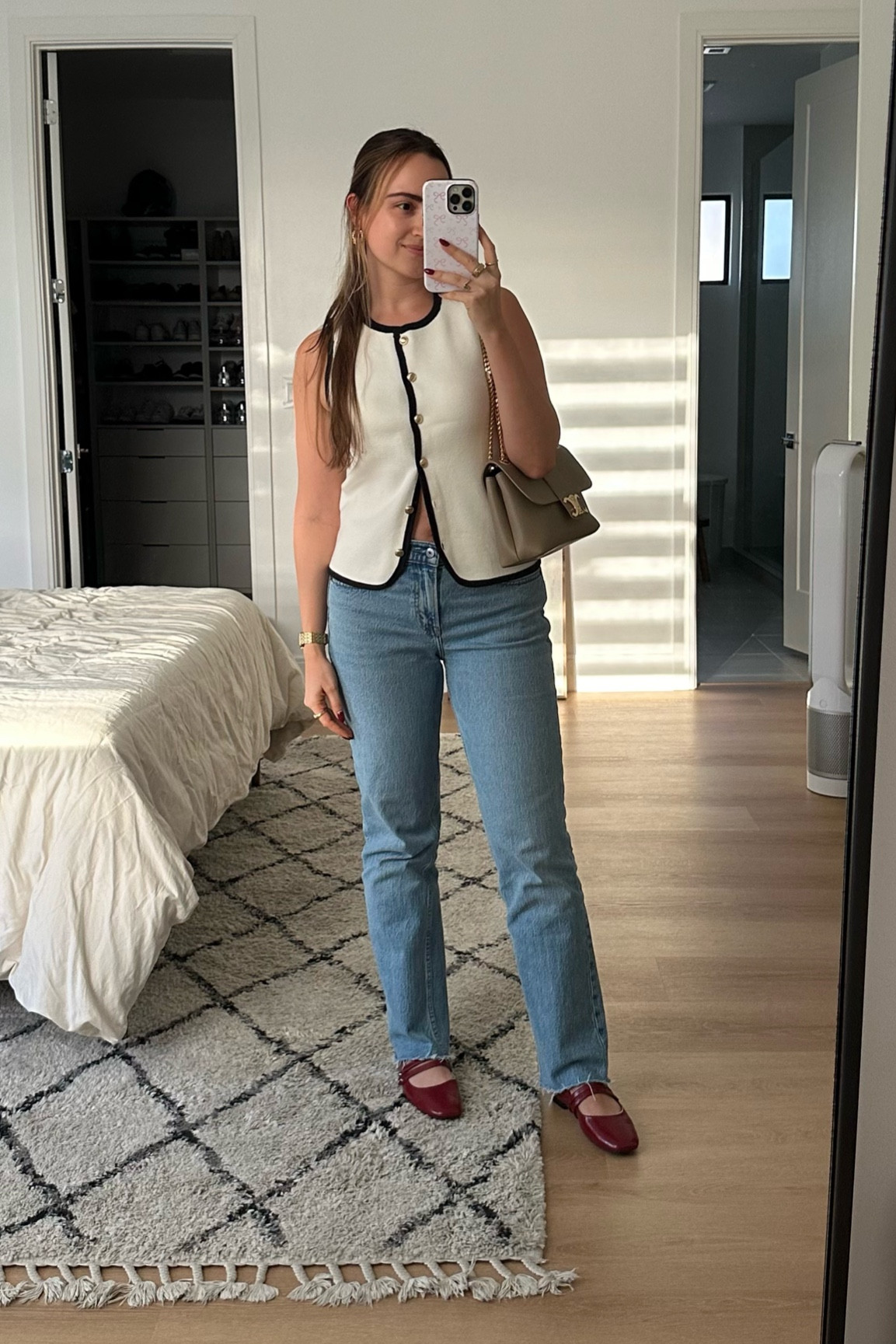 the perfect fall outfit for warm weather 

bag is Celine Victoire 

Jeans | sweater vest | red shoes | fall style 



#LTKFindsUnder100 #LTKSeasonal #LTKShoeCrush