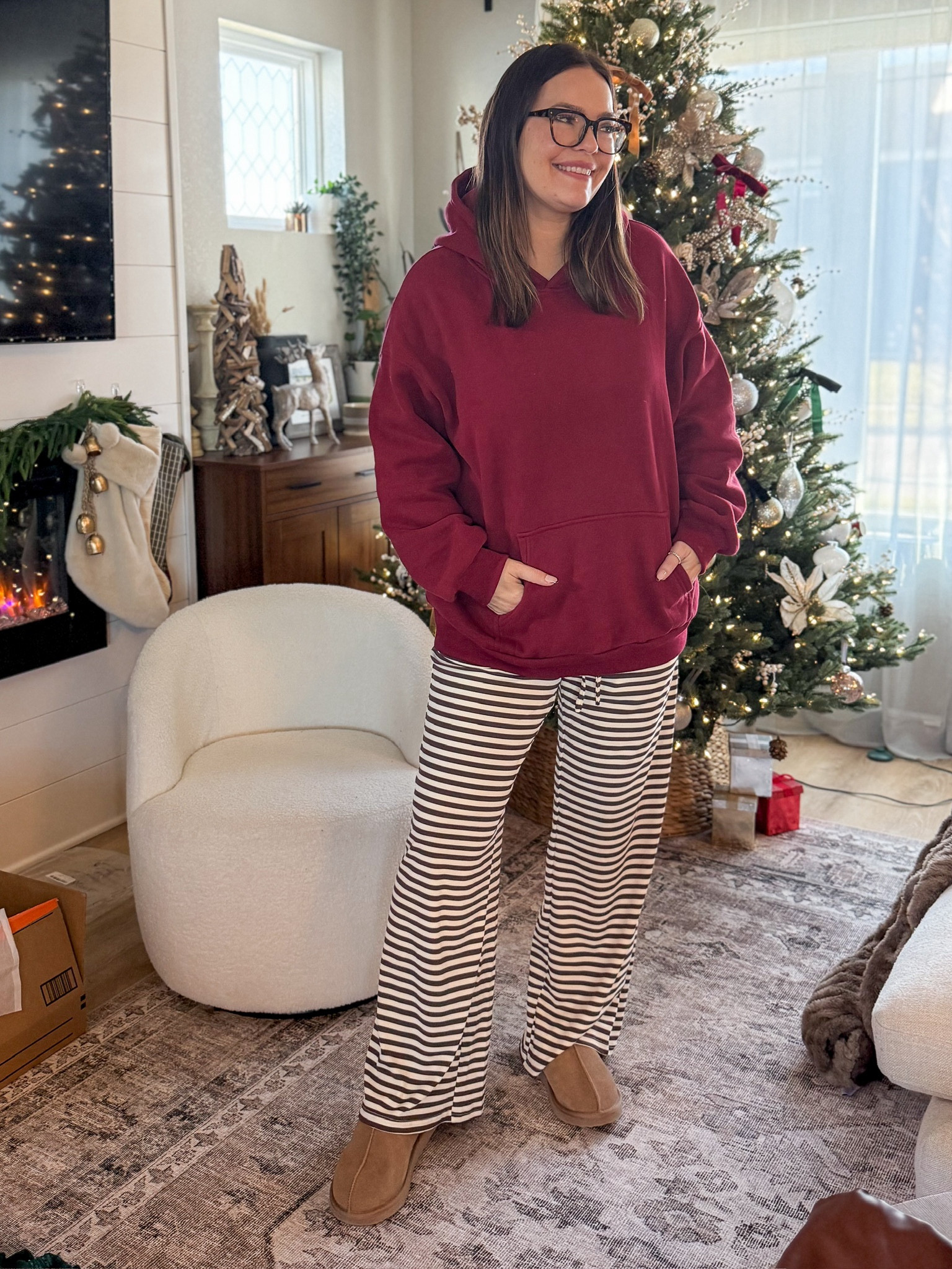 I’m living in comfy loungewear and I love this hoodie and striped lounge pants combination from Amazon / sized up one in the hoodie and wearing true size large in the pants // loungewear ootd / striped lounge pants / red sweatshirt / slippers 

#LTKSeasonal #LTKMidsize #LTKFindsUnder50