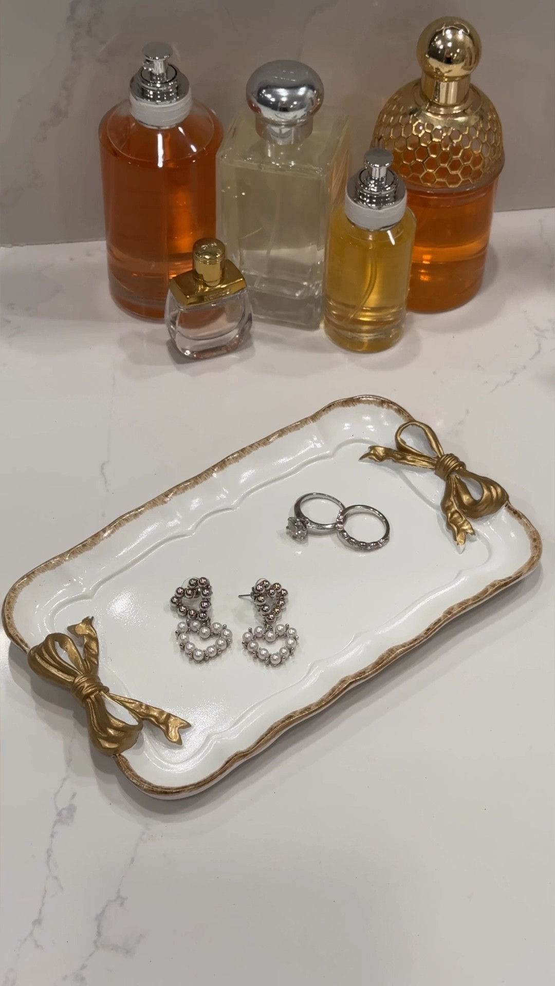 Amazon vintage decorative jewelry tray under $10, gold bow tray, bow dish, Amazon under $10, vanity organizer 

#LTKHome #LTKGiftGuide #LTKSeasonal