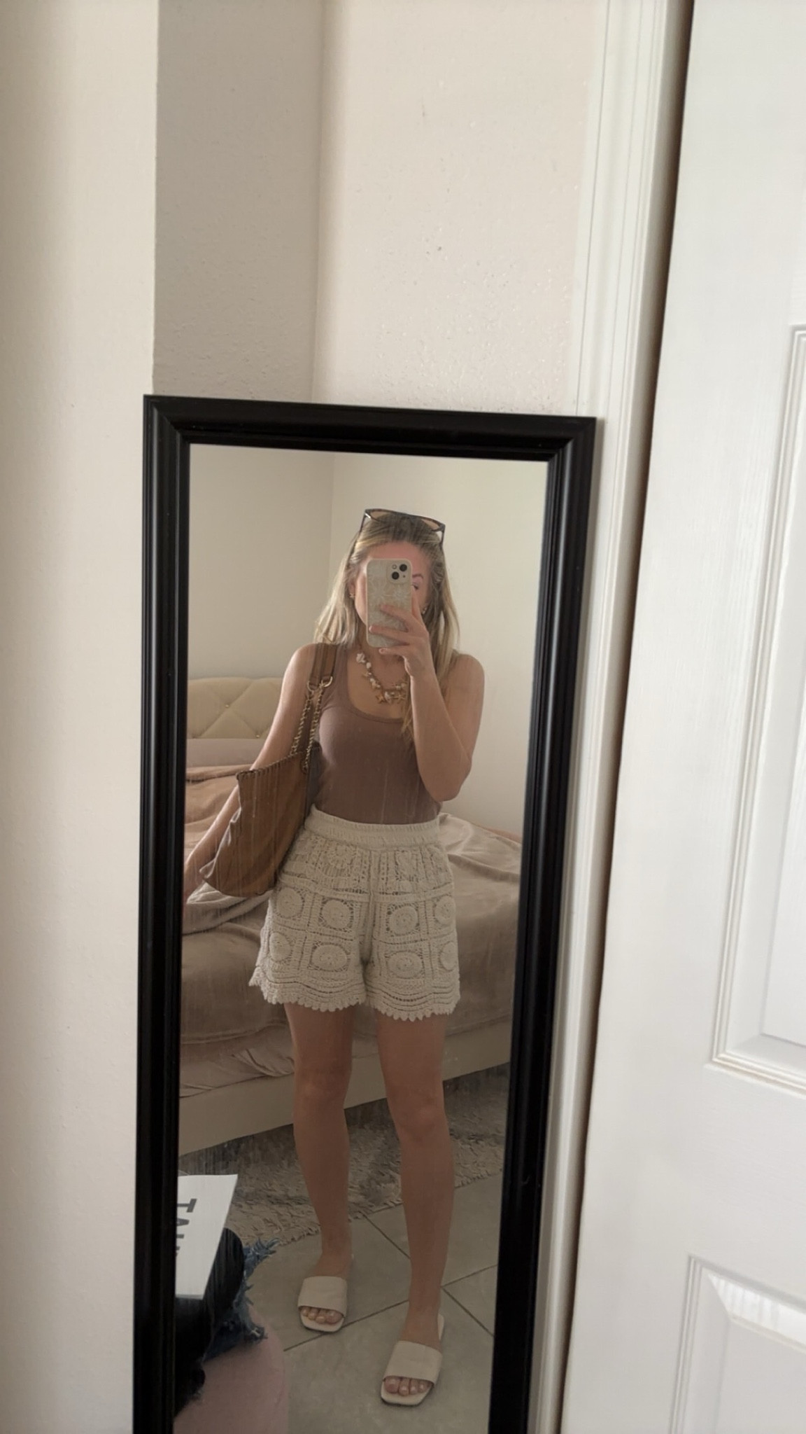 Casual summer shorts outfit wearing crochet shorts and old navy tank top under $10 true to size!

#LTKSeasonal #LTKootd
