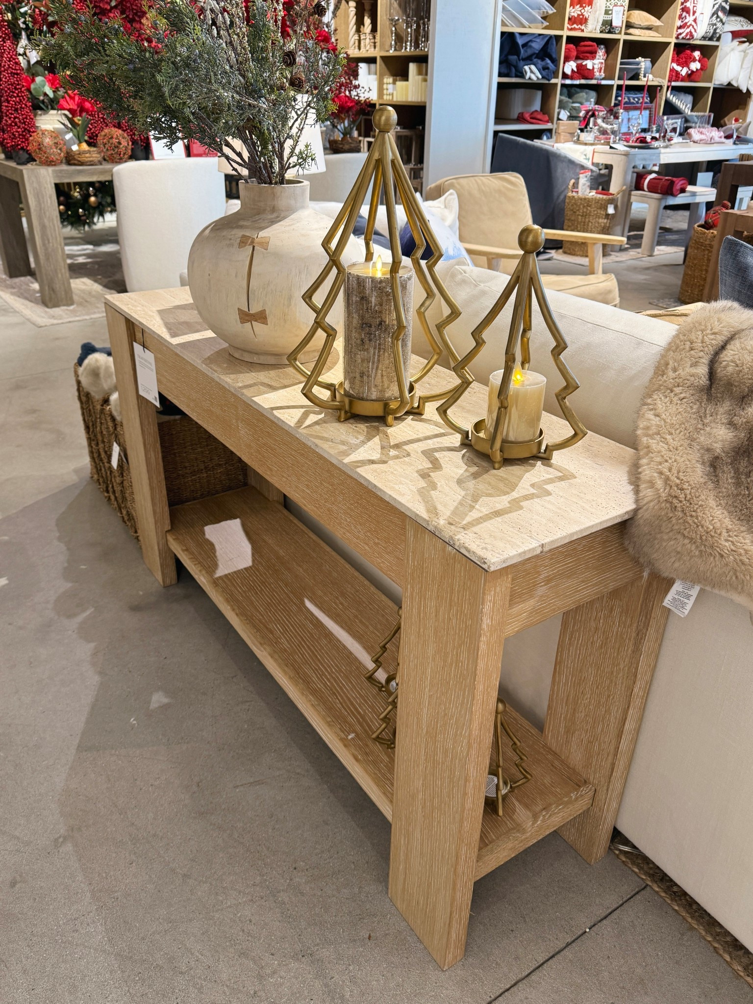 Loving this Travertine Console Table from Pottery Barn — the stone top paired with warm wood tones gives it such an elevated, timeless feel. 🤩  Styled here with gold Christmas accents for a festive touch, but this piece works beautifully year-round. Linked other styles for a similar aesthetic!  💫 #PotteryBarn #ConsoleTable #NeutralHome

#LTKGiftGuide #LTKHome #LTKHoliday