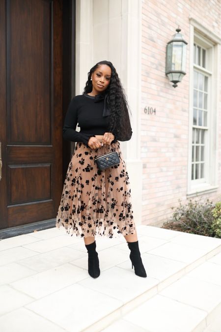 This whole outfit is Amazon and I’m obsessed!

Midi skirt, flowy skirt, sweater, black sweater 

#LTKstyletip #LTKSeasonal #LTKfit