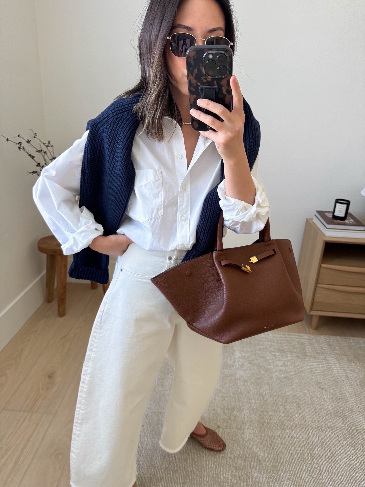 fall staples. White Button Downs. Yes, a closet staple for me, year round. This one is the poplin one from Gap, but I'll probably wear my AYR oxford since it's my favorite. I'll link the Gap oxford as well.

Quince sweater small
Gap poplin Big Shirt petite xs
Everlane curve jeans 26, Sized up 2 and cut hems
Staud flats 35
DeMellier bag medium
Le Specs sunglasses
Dorsey James necklace 15"

Petite style, fall outfits, transitional style, jeans

#LTKootd #LTKPetite #LTKSeasonal