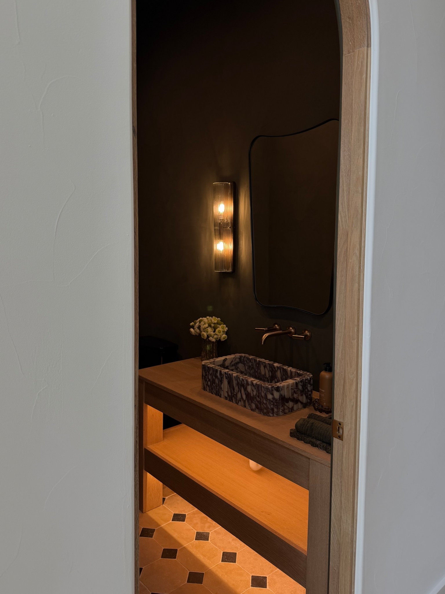 Our moody powder bath! Amazon mirror, power bath light sconces, viola sink from Etsy, amazon vase, amazon stone dish for hand towels, and target hand towels! 


Custom home build, new build, bathroom walll sconces, amazon bathroom mirror, viola sink, moody powder bath 