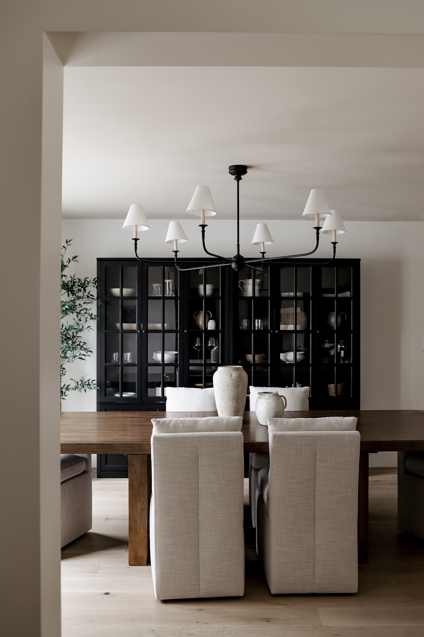 Shop our dining room featuring this viral Amazon hutch, dark wood dining table, rolling linen dining chairs, and decor! Lots of the decor is affordable Amazon! 

#LTKHome #LTKSeasonal #LTKFindsUnder50