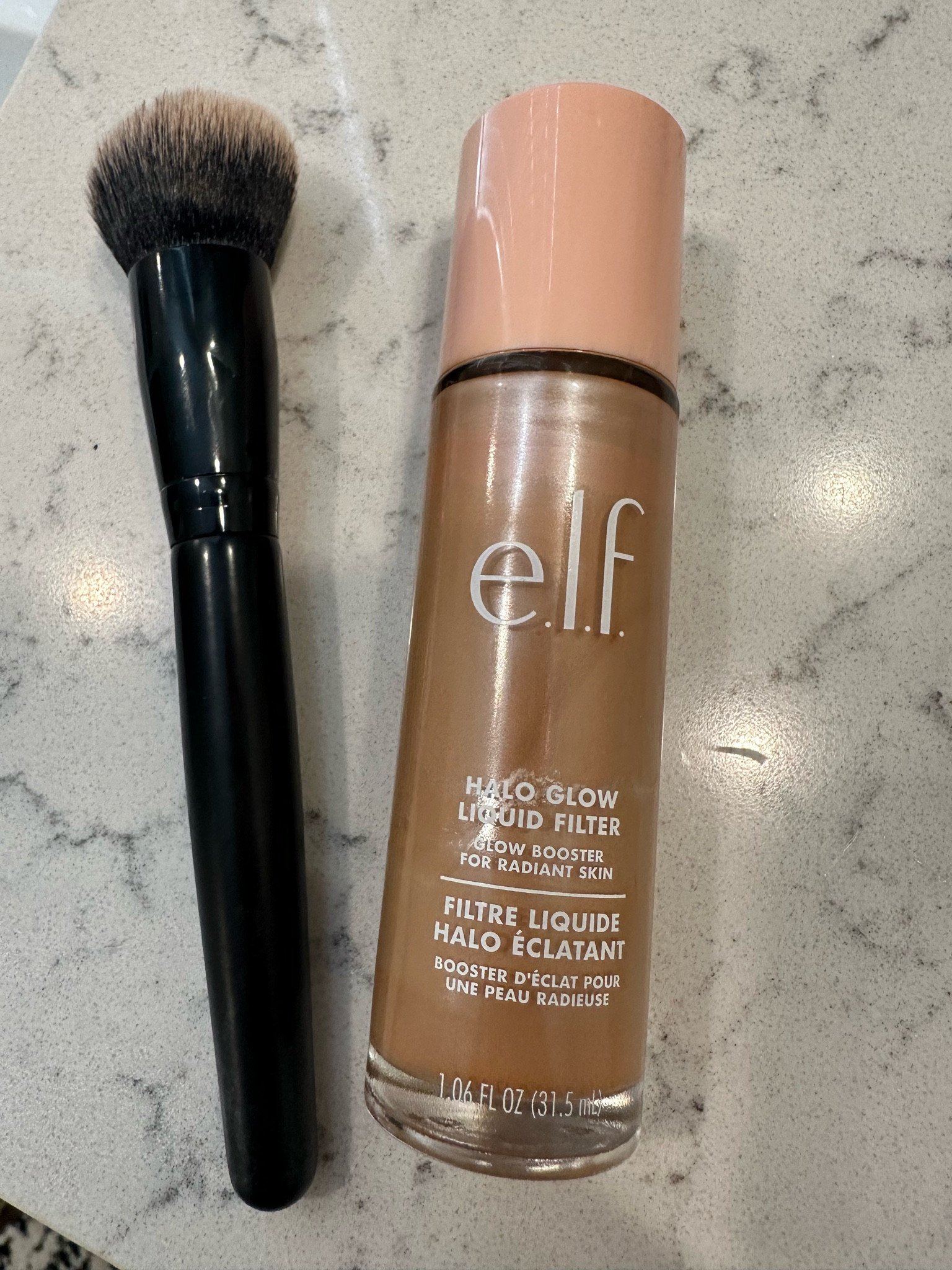 Ok this product is a game changer for me ! I love the glow that it gives off without any shimmer , it really brightens up your face and is super lightweight 

Halo glow liquid filter 
E.l.f cosmetics 
Skincare 
Makeup brush 

#LTKfindsunder50 #LTKbeauty #LTKwedding