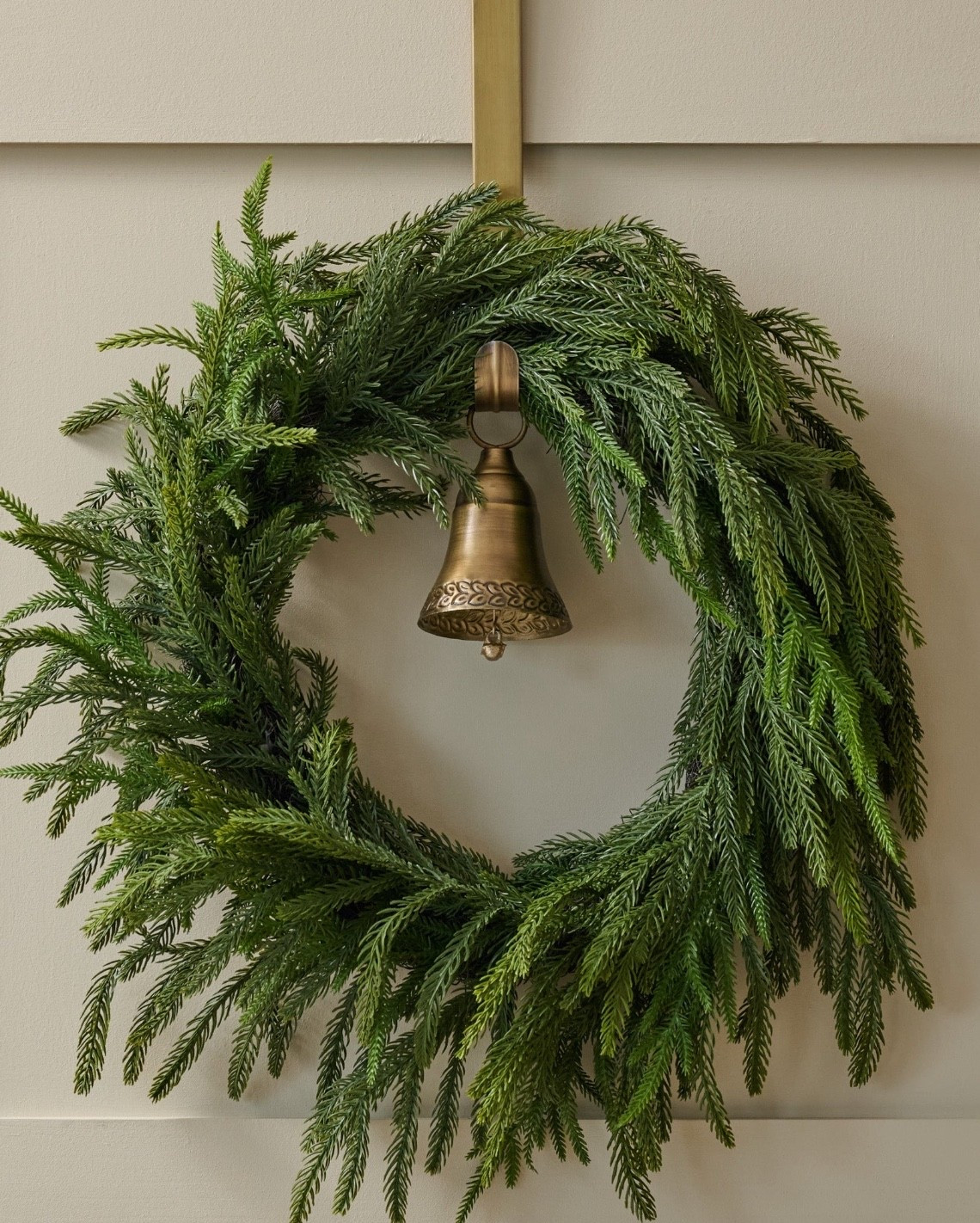 Brass bell wreath hanger. Crafted from 100% brass and finished with an etched bell, it adds a classic, collected touch to your holiday decor.

#LTKHome