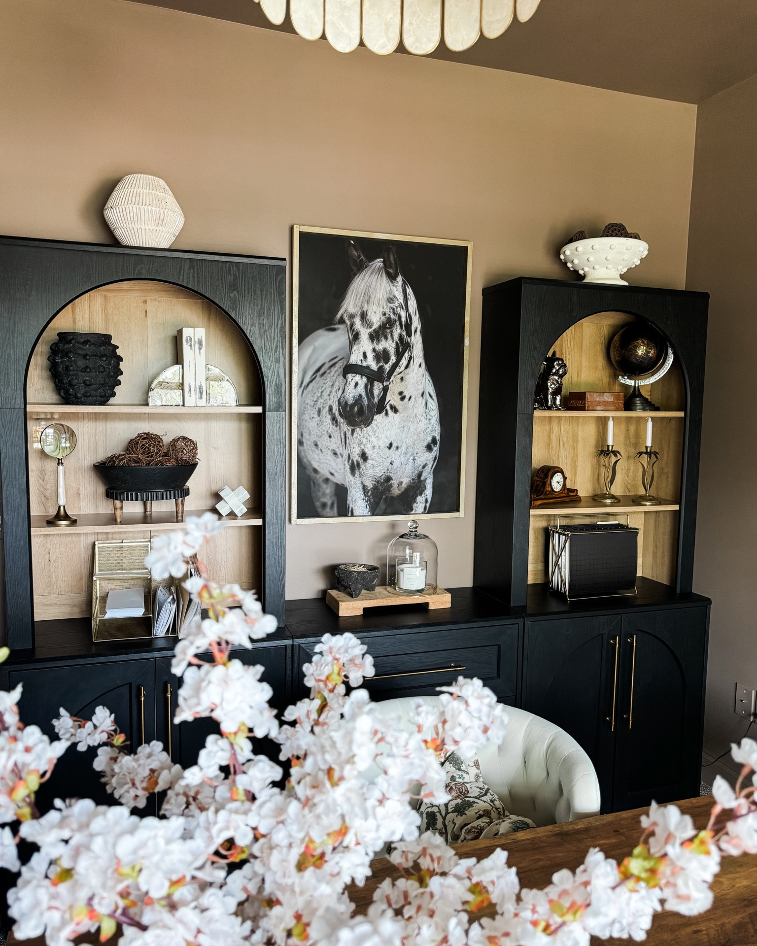 Moody Study

These cabinets have been the best decision for my study. They’re beautiful and very affordable.
My study walls are color drenched with Porcini by Benjamin Moore.

Chandelier, desk, chair, horse art, Mopio Blake storage system, bookcases, dressers, office units, vases, spring stems, mortar, candle, matches, pedestal, marble sculpture, antique brass doorknob, cherry blossoms, record player, hobnail vase

#LTKHome #LTKstorytime #LTKSeasonal