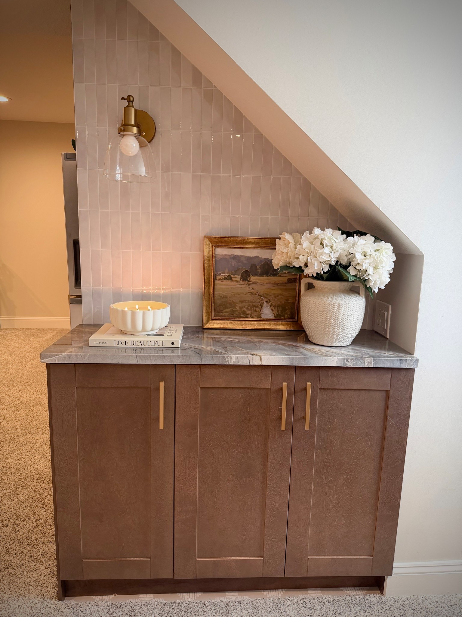 This little corner of our basement is ✨compete✨ I didn’t get a single before photo so I had to screenshot some of the videos I took when we moved in 🙃 it turned out beautifully! This area was always hidden by a heavy barn door that we never used. Now the girls use it all the time for their snacks and games. It was a lot of work but worth it! 🤩

#LTKSeasonal #LTKgrwm #LTKHome