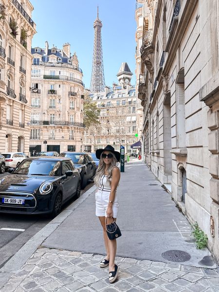 Fall fashion. Chanel inspired outfit. White sweater tank top. White shorts. Black hat. Fall hat. Espadrilles. Bucket bag. Black bucket bag. 

#LTKstyletip #LTKitbag #LTKtravel