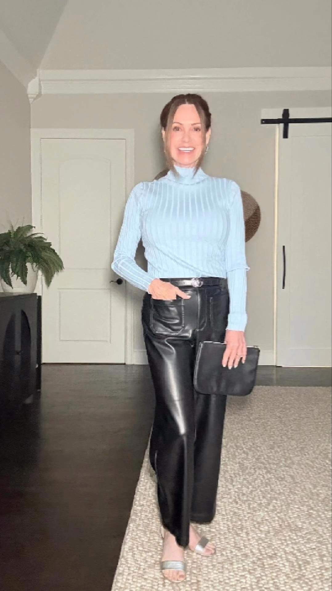 Wide leg faux leather pants that go with everything! These are a cropped style. They’re great for everyone. Paired with a ribbed mock turtleneck and a cropped white button down. The possibilities are endless!
Wearing size 2p pants, large sweater (because it’s fitted and they were out of the medium) and size small petite button down).

#LTKStyleTip #LTKSaleAlert #LTKOver40