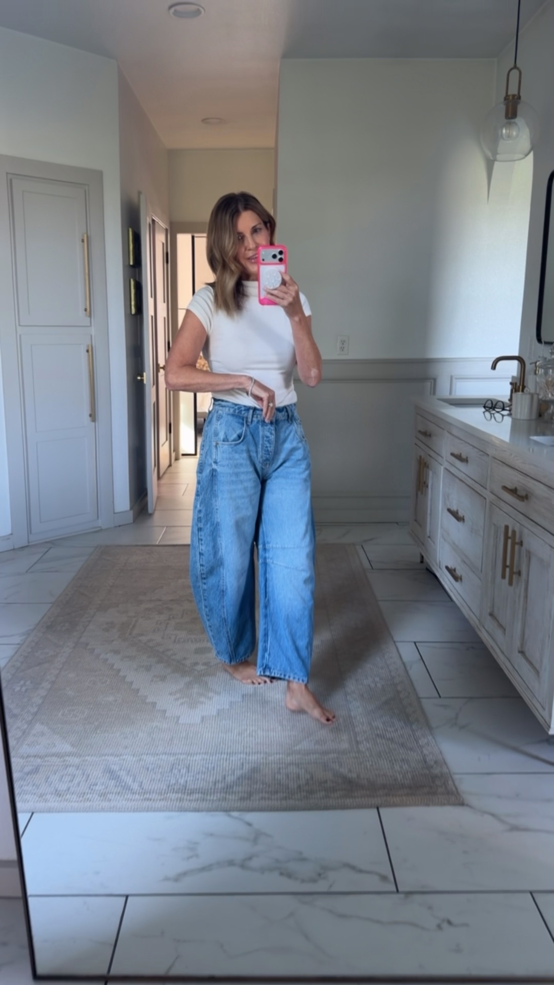 Free People good luck barrel leg jeans in the color ultra light beam. I’m typically a size 27 in jeans and sized down to a 26

#LTKOver40 #LTKSaleAlert