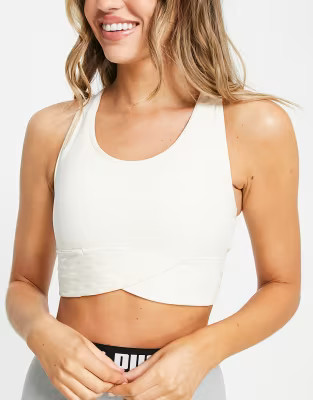 Puma Training Flawless mid support sports bra in cream | ASOS (Global)