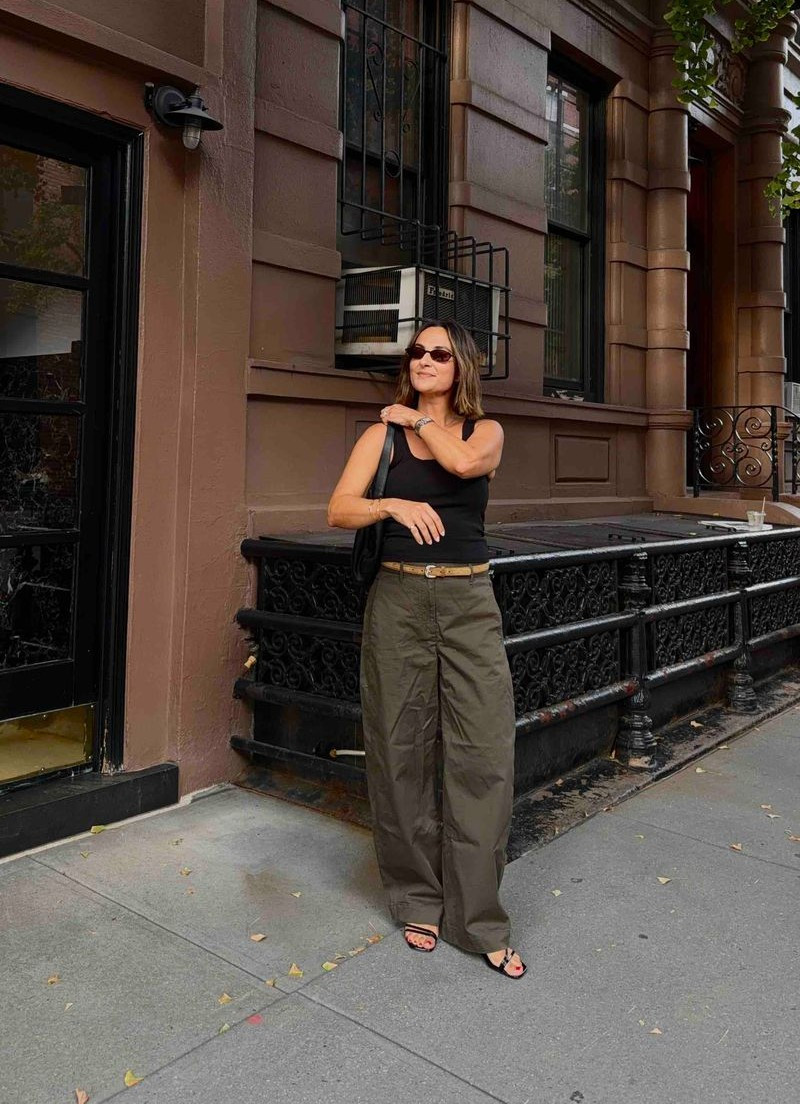 An easy transitional outfit made up of elevated basics. I paired a fitted black tank with olive wide-leg pants, simple heeled sandals, and a slim belt. The neutral color palette makes this such a versatile look for these in-between weather days.  

 #LTKootd #LTKSeasonal