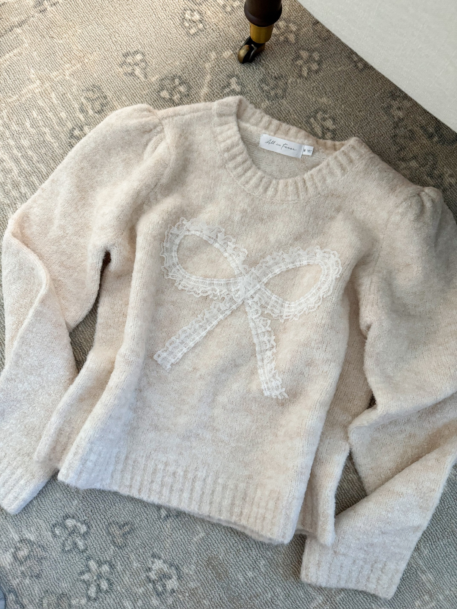 How pretty is this lace bow sweater from Nordstrom?! It will be perfect for fall and winter. Wearing size small. Fall sweaters // girly sweaters // neutral sweaters // Nordstrom finds 

#LTKSeasonal #LTKFindsUnder100 #LTKStyleTip