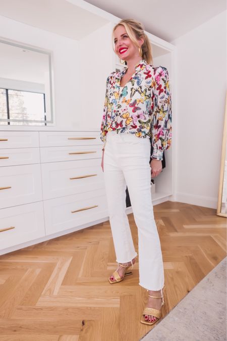 These white jeans are a must-try if you feel like you can’t ever find a good pair of white jeans. Just trust me…they’re SO good. I have the same style in multiple washes because I love the fit that much!

My top is one of those pieces I have in my closet that I put on and immediately feel joy. The print and color are so vibrant and fun, it has chic pleated sleeves, a flattering V-neckline, and it’s super lightweight so you’d stay cool. This is a perfect summer girls night out or dinner look.

~Erin xo 

#LTKSeasonal #LTKstyletip #LTKshoecrush
