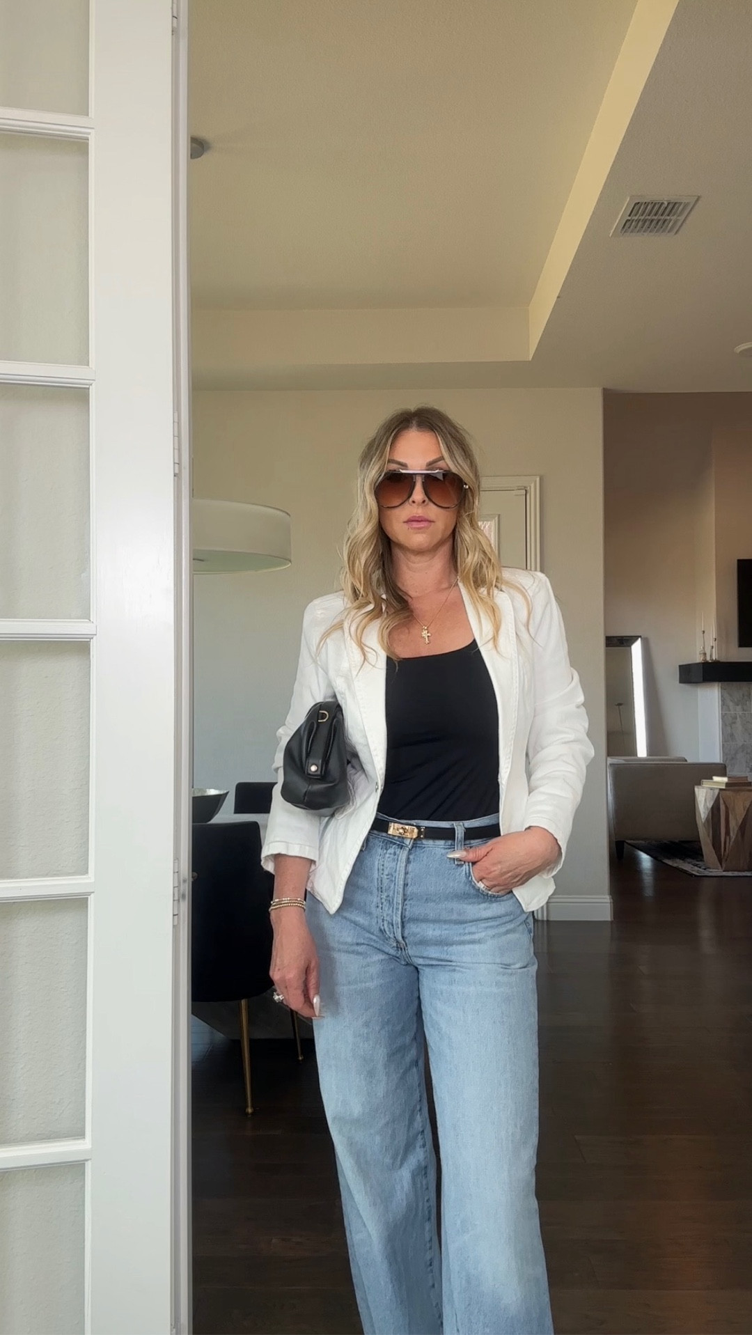 Simple pieces styled with intention 🤍
This is one of my favorite everyday outfit formulas—clean basics + structure + elevated accessories.

Wearing a black Amazon bodysuit with Citizens of Humanity denim, styled with a structured white denim blazer and belt to instantly elevate the look. Finished with classic accessories to keep it polished but still easy for real life.

Perfect example of high low style—mixing timeless staples with elevated details that make everything feel more refined.

#over40style #highlowstyle #everydaystyle #ltkstyle #effortlessstyle

#LTKgrwm #LTKootd #LTKSeasonal