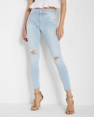 Mid Rise Ripped Raw Hem Skinny Jeans | Express