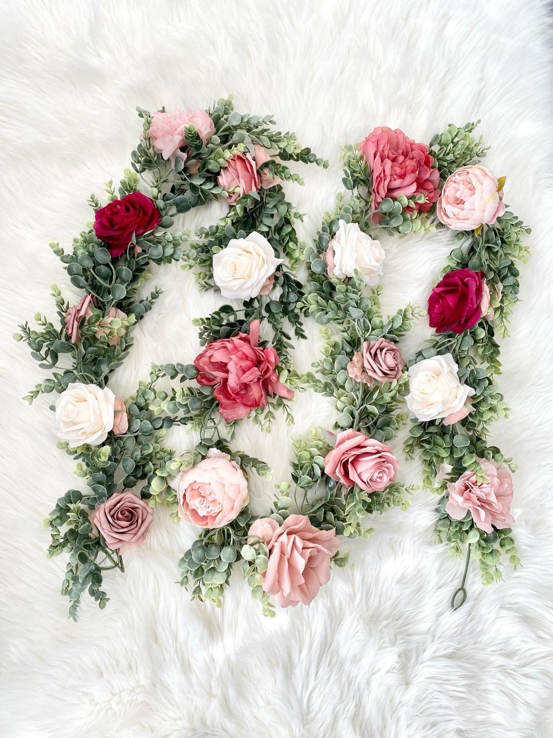 This lush eucalyptus garland is a beautiful way to add natural elegance to weddings and special events. Designed with premium faux greenery and customizable blooms like peonies, roses, ranunculus, and hydrangeas, it creates a full, romantic look for table runners, arches, or ceremony backdrops. Each garland is made to match your color palette, giving you timeless florals you can enjoy long after the celebration. 🌿 #LTKwedding #weddingdecor #eucalyptusgarland #floraldecor #weddinginspo #eventdecor #romanticwedding #tablescapestyling

#LTKHome #LTKSeasonal #LTKWedding
