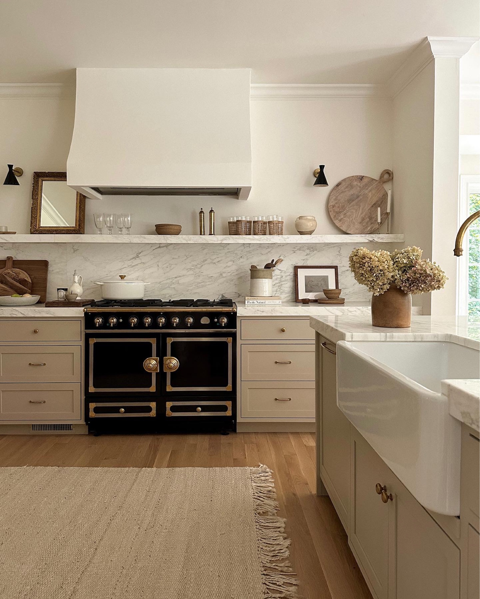 Kat Jamieson shares her farmhouse kitchen in Connecticut. Home decor, fall decor, rug, sconces, interiors. 

#LTKhome #LTKFind #LTKSeasonal