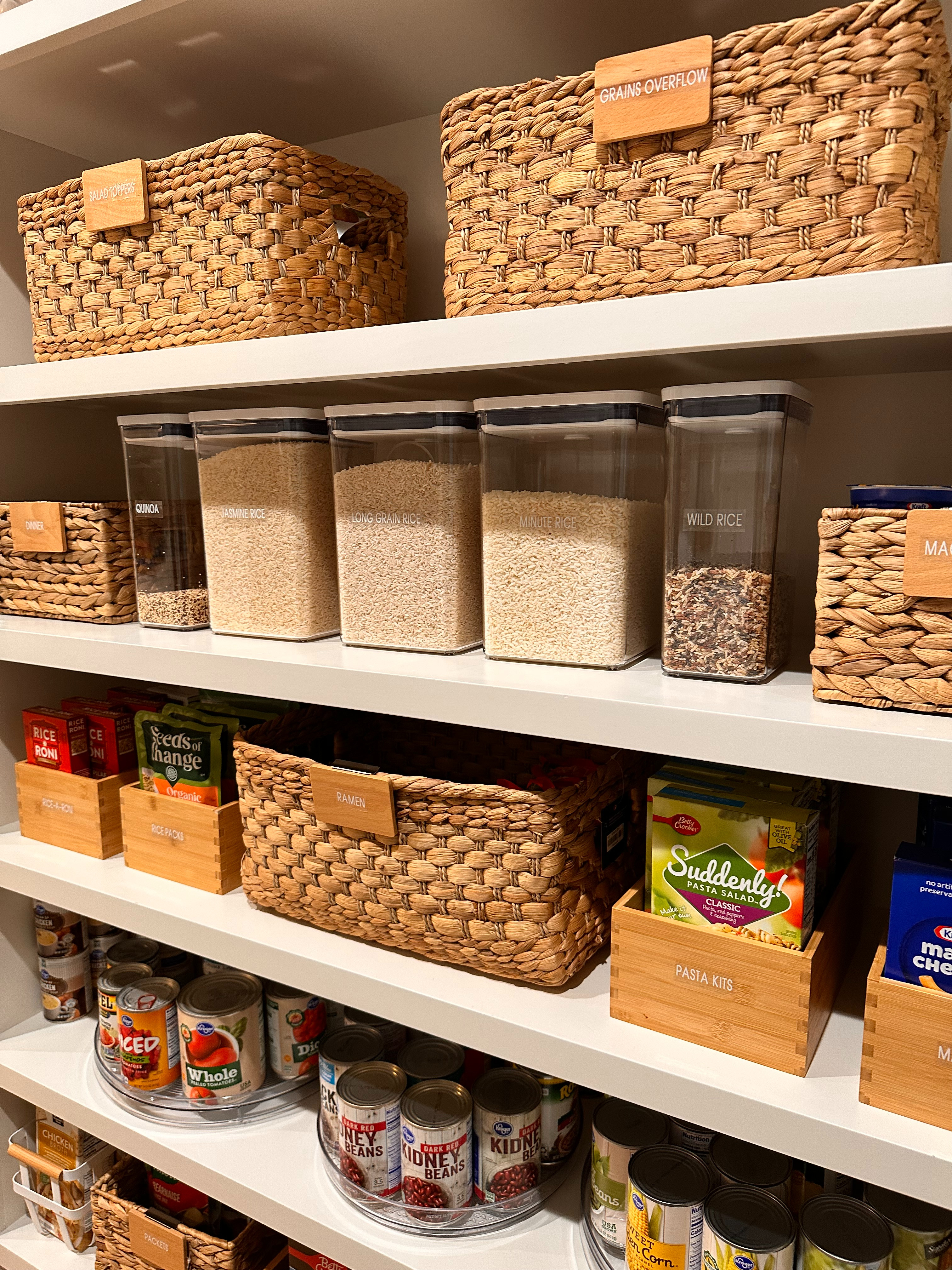 Mixing wicker, wood, and metal adds beautiful texture and interest in a pantry, just like we did here.

But most importantly, every product serves a purpose. It creates a home for your food so everything is labeled, easy to find, and looks stunning.
So beautiful and functional.

#organizesimply #pantryorganization #kitchenorganization #thetracyway
 

 #LTKHome #LTKFamily