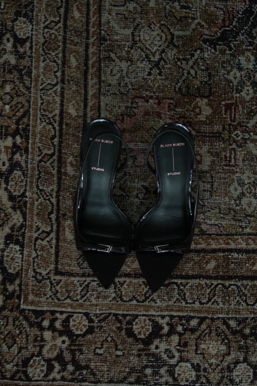 The Heidi Slingbacks by Black Suede Studio are the definition of quiet, understated luxury — a sleek pointed toe, soft suede finish, and a slim slingback strap that creates the most flattering, elongated line on the foot. They’re minimal but never boring, sharp without feeling harsh, and genuinely one of those heels that elevates an outfit without asking for attention. I originally tried the 8 but the 7.5 was the perfect fit: secure, polished, and comfortable enough for real wear.

The heel height is that sweet spot between elegant and walkable, giving just enough lift to lengthen the leg while still feeling grounded. The suede texture adds depth and softness to any look — from relaxed denim to tailored trousers to a simple black dress. They’re the kind of shoe you invest in once and reach for constantly because they always look right.

Timeless, versatile, and quietly sexy in the most effortless way — the Heidi Slingbacks are a true wardrobe anchor.

Hashtags
#BlackSuedeStudio #HeidiSlingbacks #MinimalStyle #QuietLuxury #WardrobeEssentials #ChicHeels #SlingbackHeels #OOTDInspo #FootwearEdit #ClassicStyle #LTKStyle #LTKShoes #FashionEssentials

#LTKHoliday