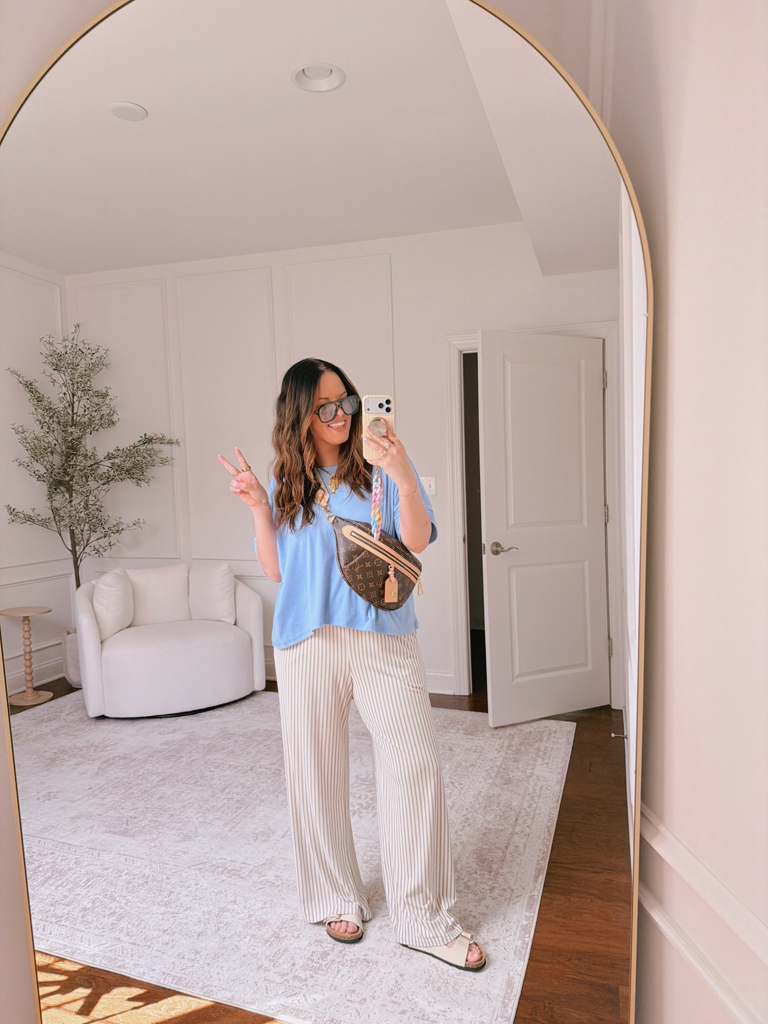 All time favorite tee and soft pants.. in a large in both..

#LTKmomlife #LTKootd #LTKMidsize