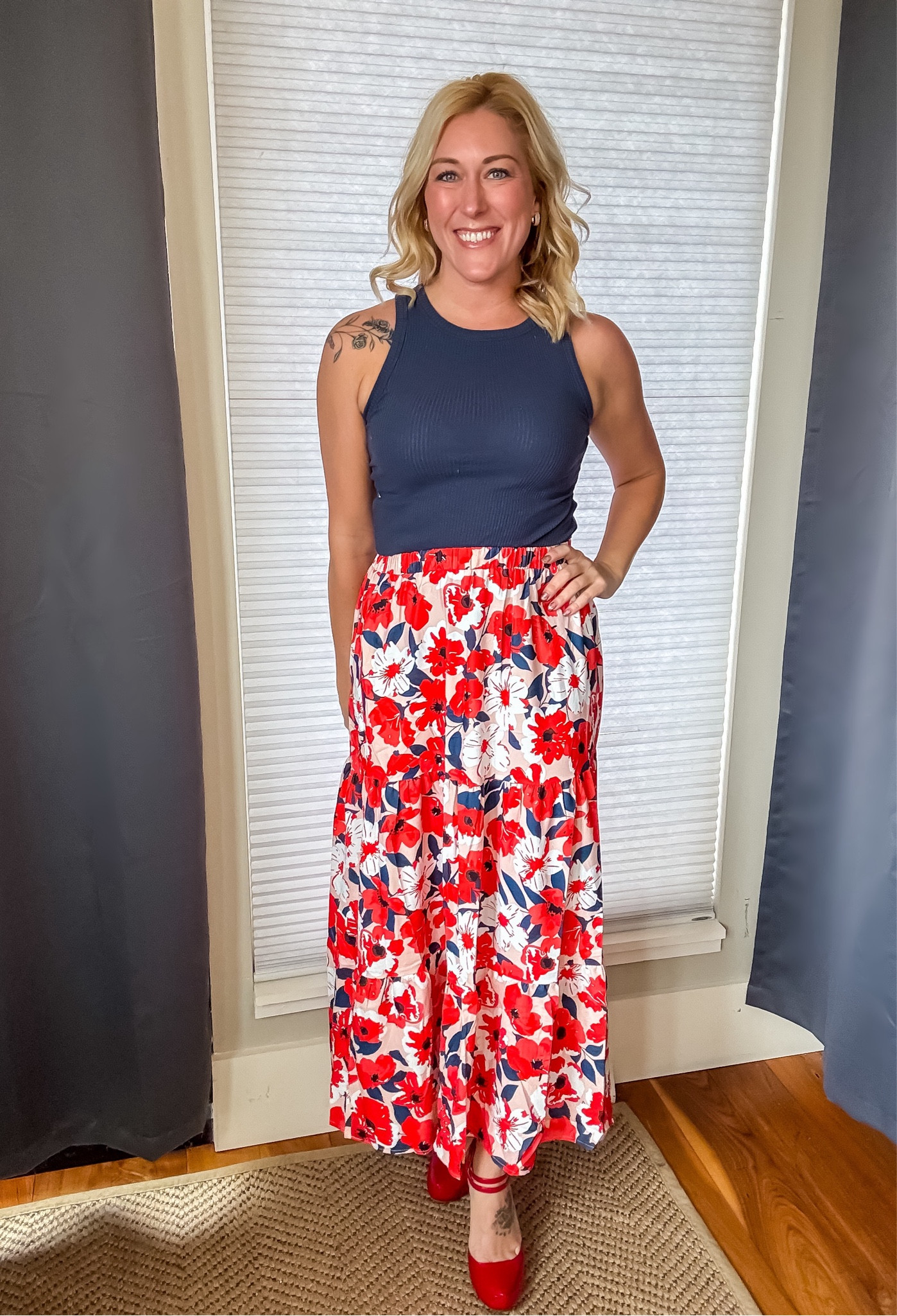 I love the statement that red makes ❤️ The floral pattern in this skirt paired with my red pumps just pops! My favorite! 