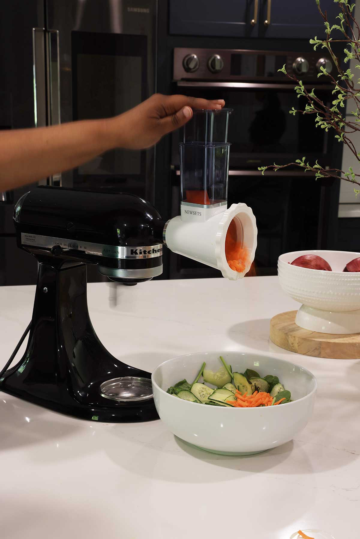 Compact slicer and shredder that attaches to your Kitchen Aid stand mixer  | Saves room in the kitchen so you don't have to buy a food processor that takes up valuable space, but does the job just as well! 

 #LTKfoodie #LTKHome