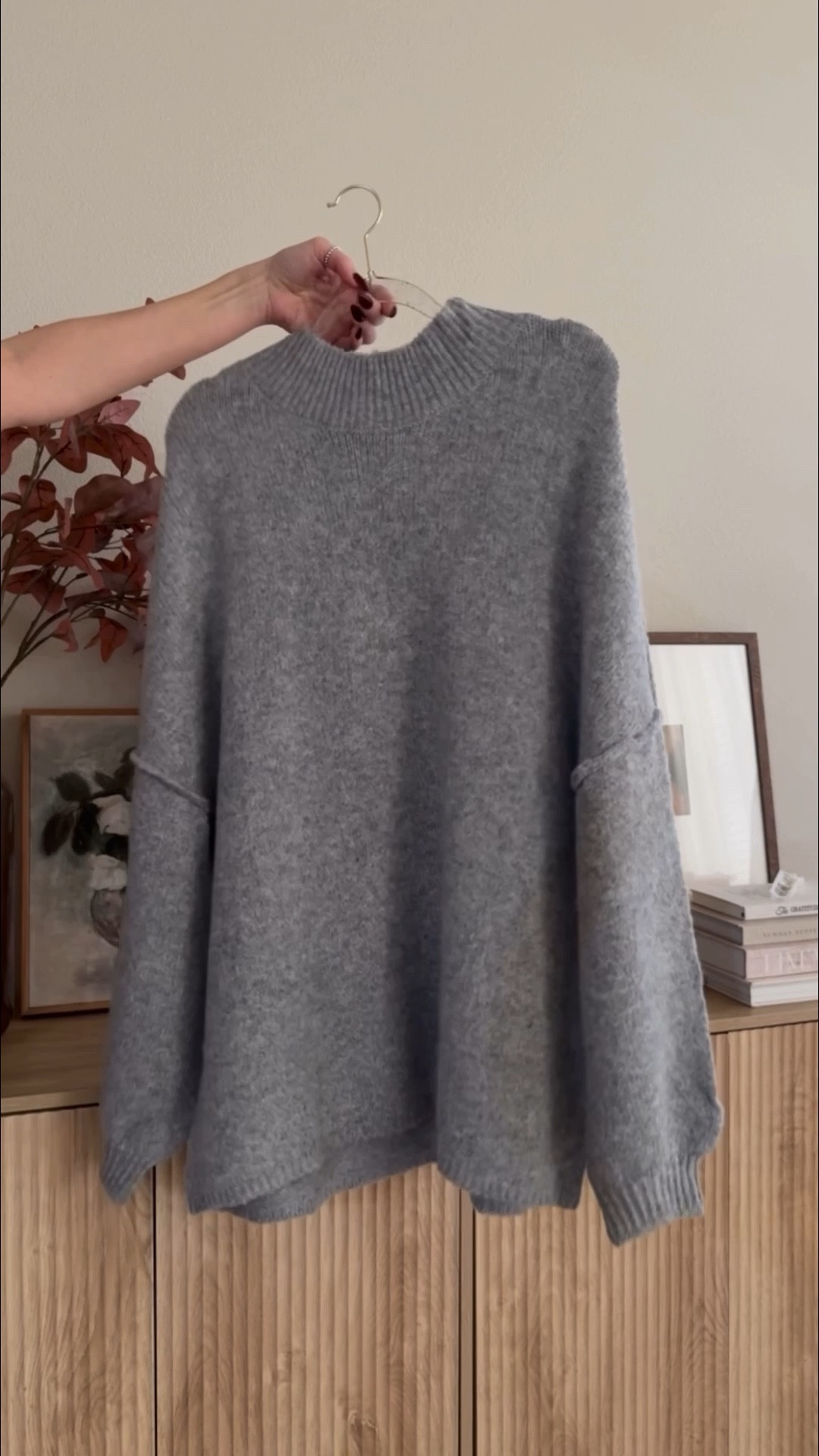 number one trending sweater on amazon right now!!

cozy sweater.  wearing medium.  no need to size up.  it's very oversized. 