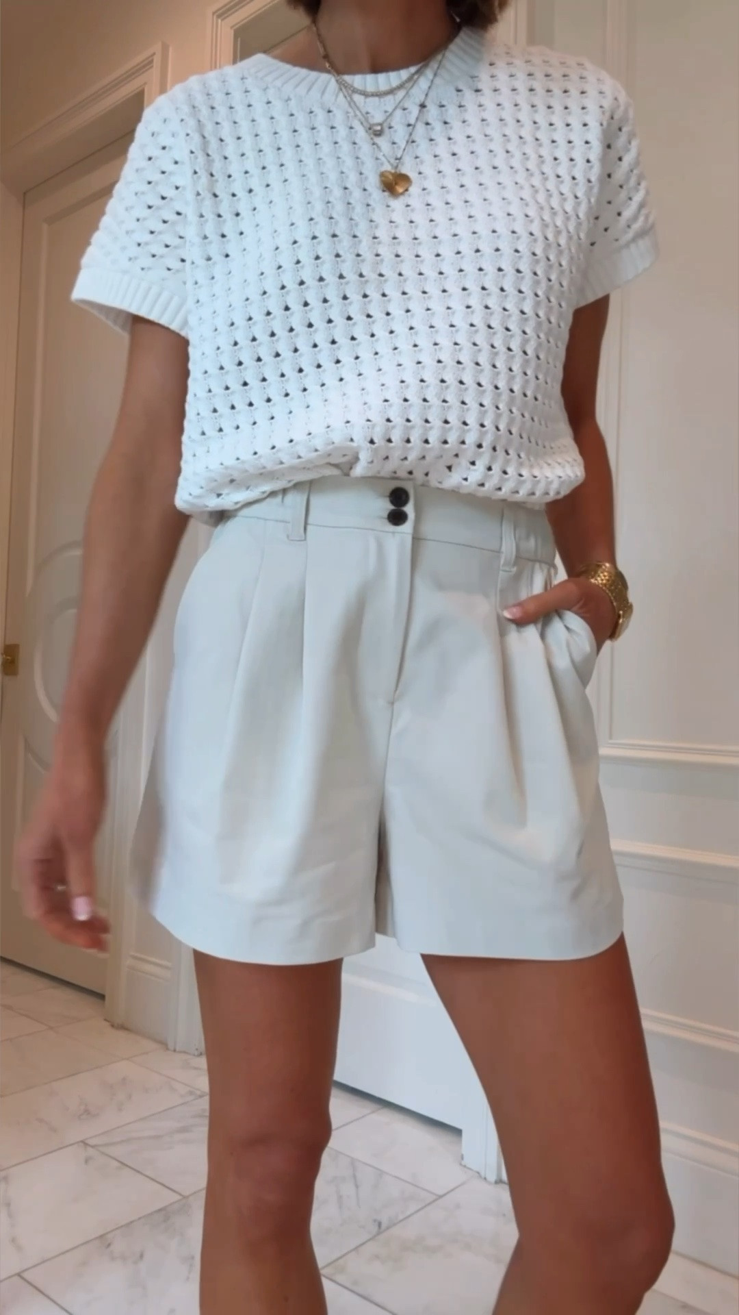 Casual cute summer outfit that's mom friendly. I'm wearing size small in my top and xs in shorts which fit tts
