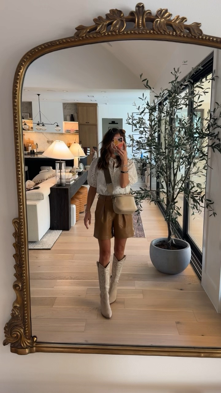 sunday outfit of the day. my leather shorts are old but I love the style and linked some similar! my gorgeous eyelet blouse is from amazon and I love the style and quality. my bag is a special release with ANDAR coming soon! 

#LTKFamily #LTKFindsUnder50 #LTKStyleTip