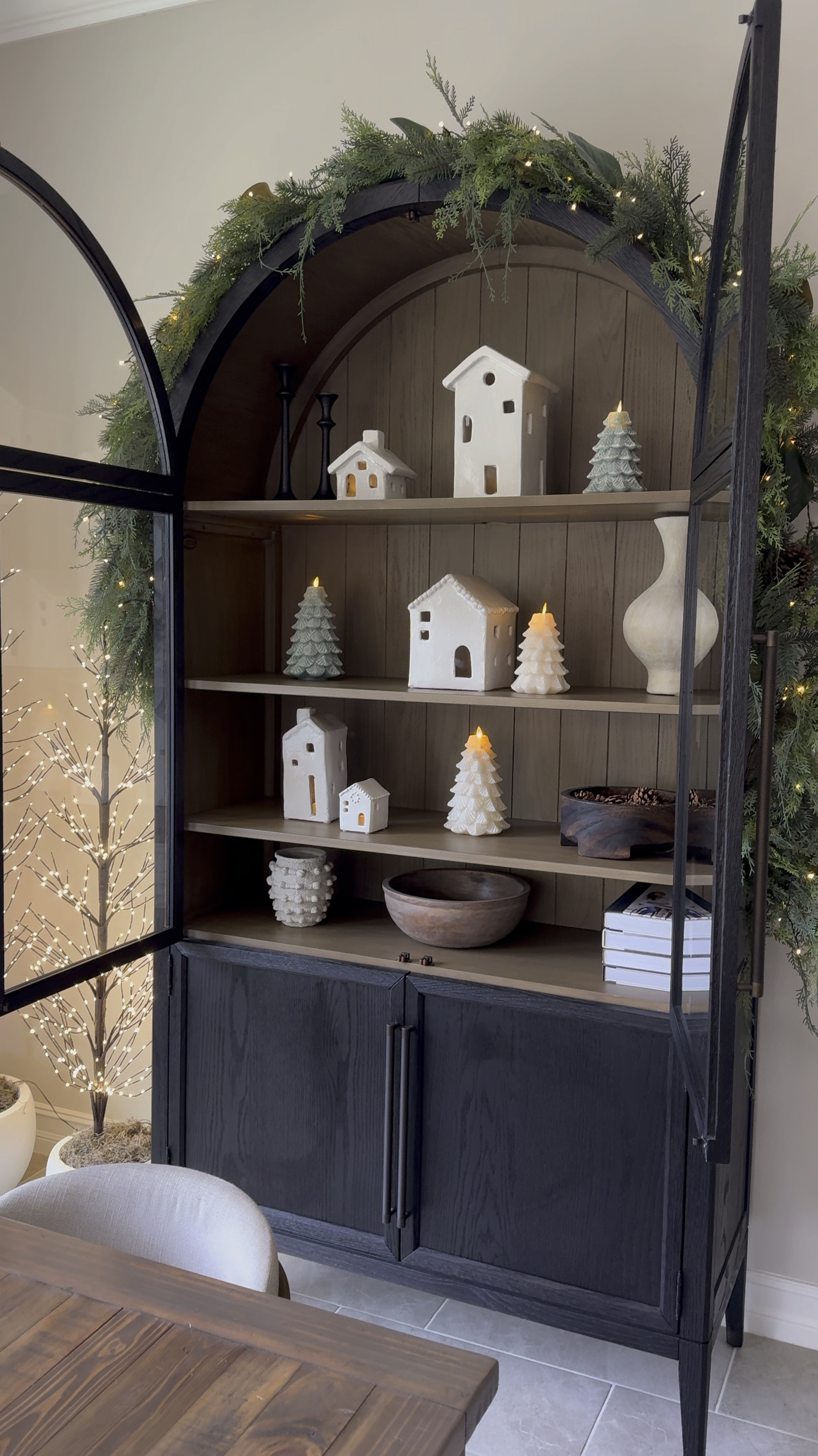 My little Christmas village is one of my favorite things to put out for the holidays. These white ceramic houses from pottery barn always sell out. They look so pretty with a tea light in them.

#LTKVideo #LTKHoliday #LTKHome