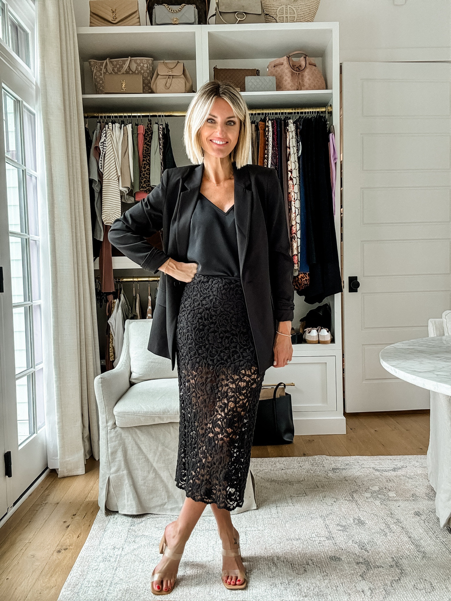 This outfit 👏🏼 Can’t get over this skirt from Target - it’s currently on sale! Wearing XS! 

Loverly Grey, Target finds, Target sale, fall looks, fall outfits, black midi skirt, blazer, all black outfits 

#LTKStyleTip #LTKSaleAlert #LTKSeasonal