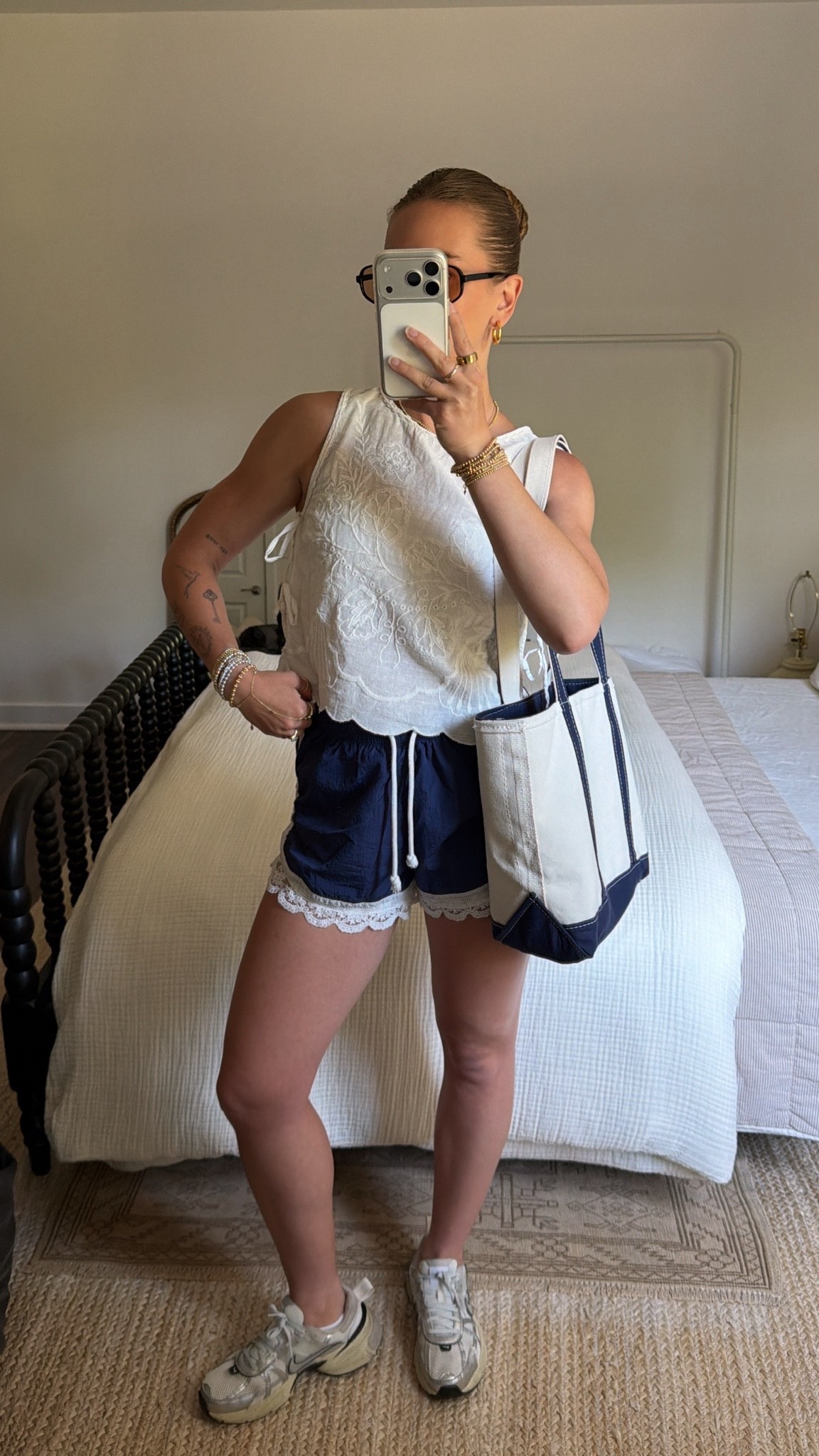 5/20/26 Sporty Chic Summer Outfit

A casual sporty-chic summer outfit 🤍 styled my lace trim activewear shorts from Anthropologie with a lightweight Free People top, Nike sneakers, and simple Amazon sunglasses for an easy everyday look. Comfortable but still feels cute and elevated—everything is linked here ✨

#LTKootd #LTKSeasonal