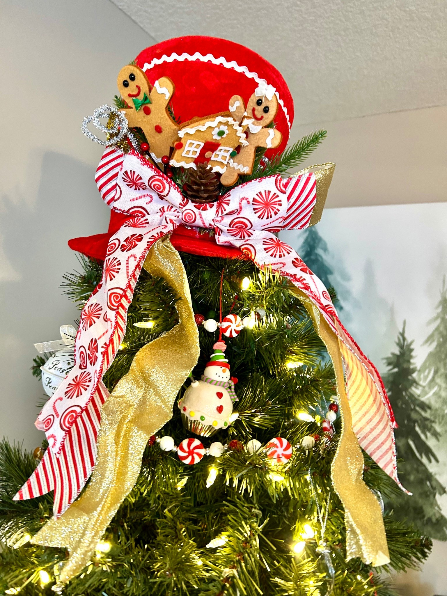 Gingerbread hat topper on our living room tree! ✨🎄

#LTKFindsUnder50 #LTKHoliday #LTKHome