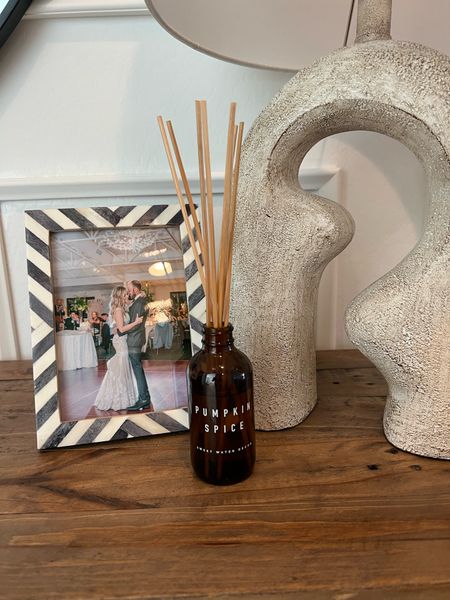 Entryway decor details on the console table! Picture frame is an Amazon find, unique lamp Amazon find, diffuser is a small shop and it’s clean fragrance!! Love it  

#LTKhome #LTKunder50 #LTKunder100