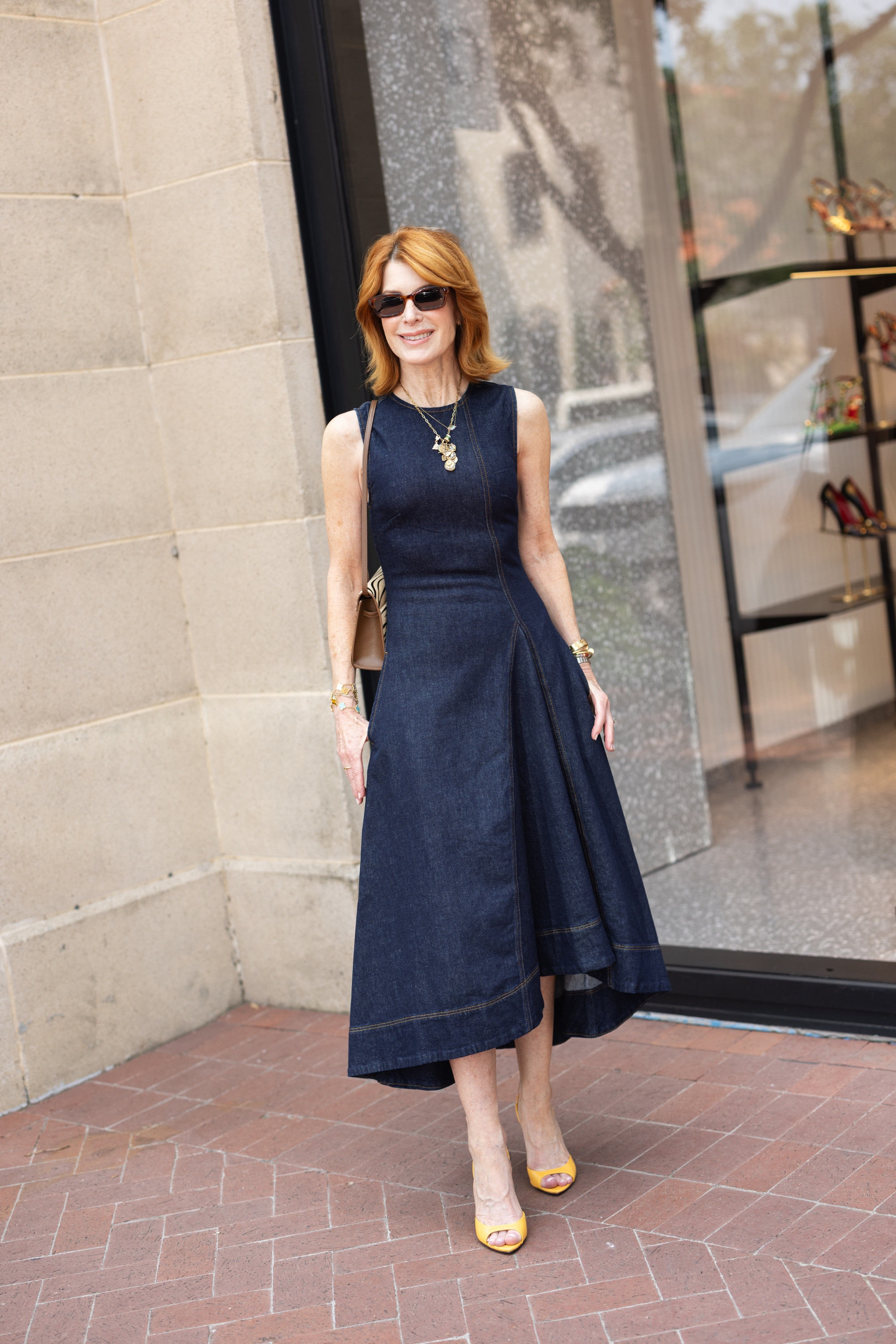 This dark denim dress is such a chic summer-to-fall piece, and the zebra bag gives it the perfect modern touch. Add yellow heels and layered jewelry for an easy date night outfit, lunch look, or polished daytime outfit. #FallOutfits #DateNightOutfits #WorkOutfits #FashionOver40 

 

#LTKOver40 #LTKootd #LTKSeasonal #LTKOver40