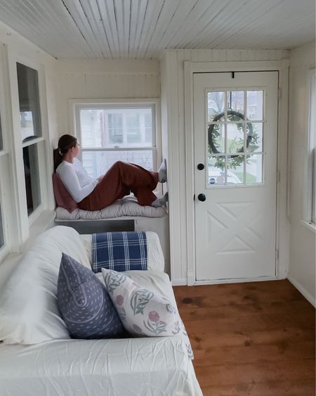 Sunroom makeover — neutral window seat cushion and plaid blanket. Cottagecore decor 

#LTKhome