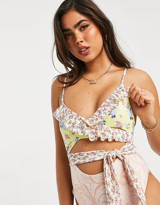 River Island floral print ruffle wrap swimsuit in pink | ASOS (Global)