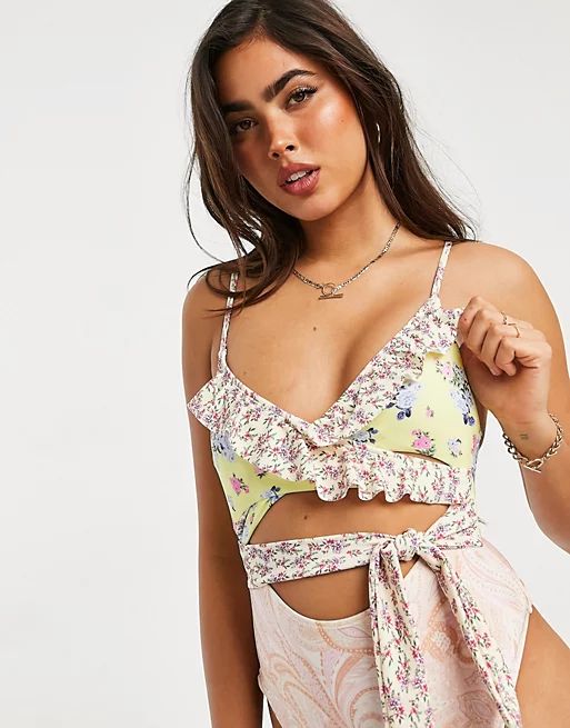 River Island floral print ruffle wrap swimsuit in pink | ASOS (Global)