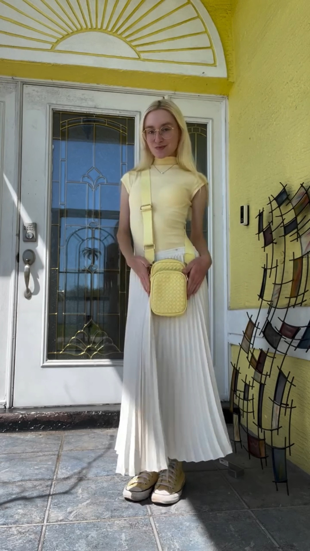 Fit check featuring the “Celeste Crossbody" from Urban Expressions 🌻☁️💛 Wondering how I achieved such a clean tick with this low waisted skirt? 🤔 I’m actually wearing a DRESS underneath 🤫🙈🤭 Shop exact pieces and similar styles linked to this post! 🛍️🔗

#ootd #outfit #fitcheck #yellow #butteryellow #yellowdress #maxiskirt #whiteskirt #whitemaxiskirt #pleatedskirt #yellowbag #crossbodybag #cellphonebag #spring #springoutfit #pastel 

#LTKootd