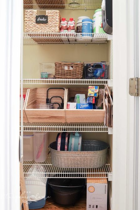 My walk-in pantry has a section of shelving for larger items. I love the metal tub. It’s not just useful for storage, but also for party drinks on ice and such.

#LTKHome