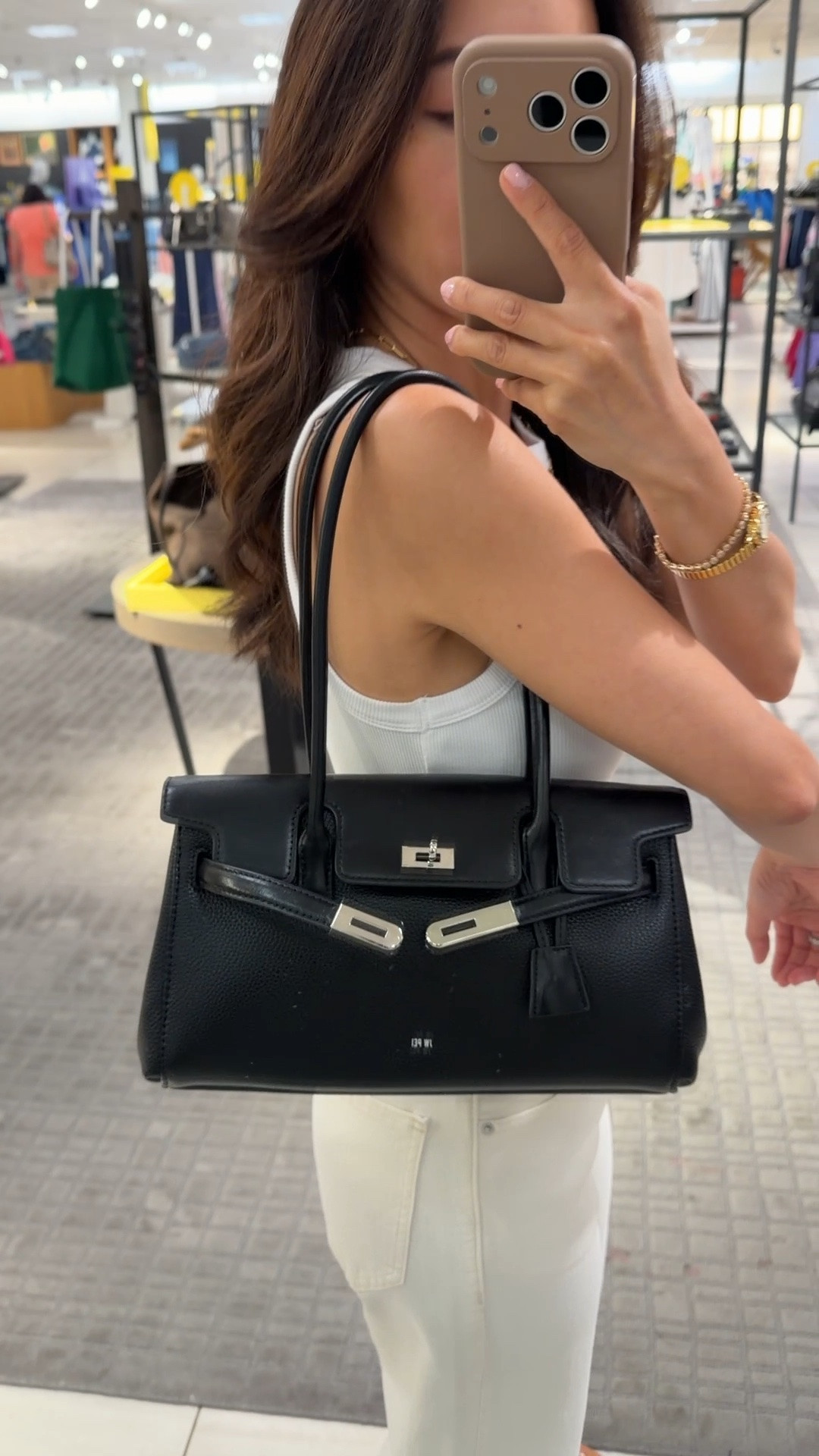 Very cute and spacious bag from Nsale! Smooth top, pebbled faux leather bottom 
• Madewell jeans 24 short 
• Madewell tank xxs 

Nordstorm anniversary sale black handbag

#LTKPetite #LTKSaleAlert #LTKWorkwear