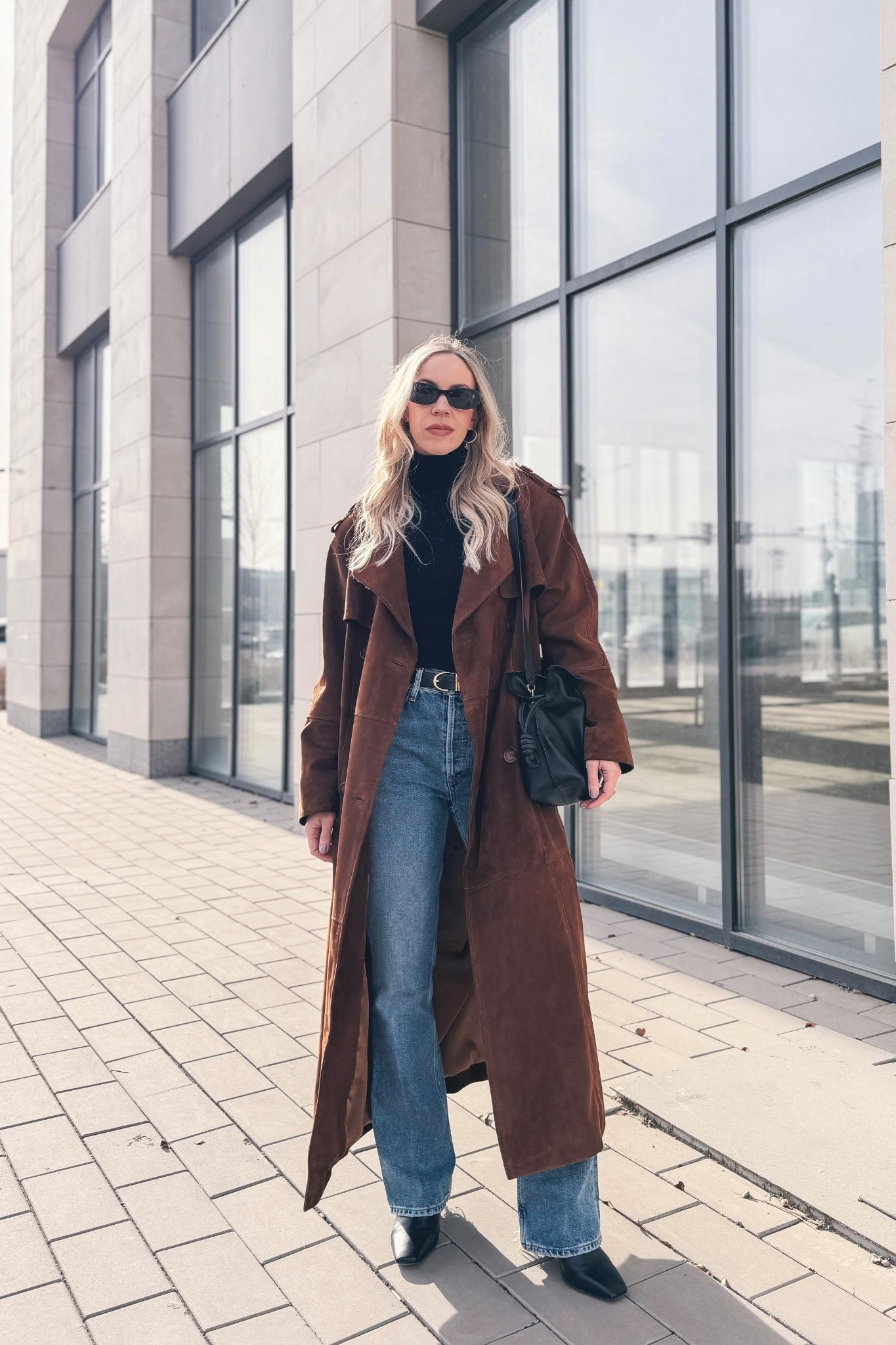 Spring outfit, suede trench coat, bootcut jeans, minimal style with black sweater and jean, CBK style

#LTKSaleAlert #LTKSeasonal #LTKOver40