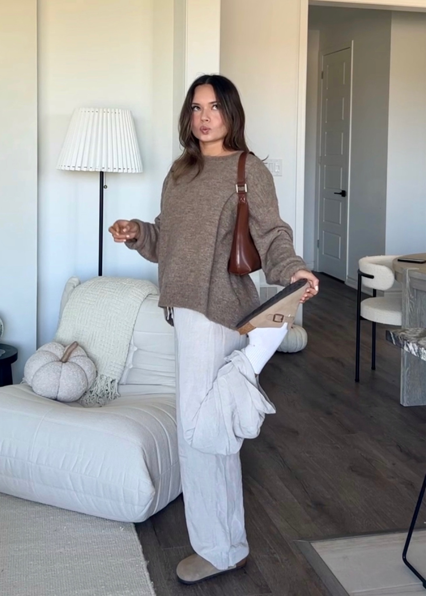 fall fit 🍂🤎  neutral fall fashion

knit sweater, brown purse, linen pants, Birkenstocks 

#LTKSeasonal